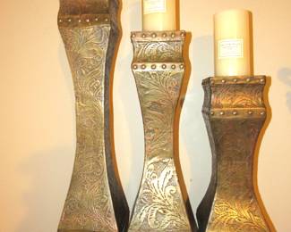 Tall brass on wood pillars