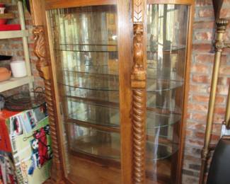 Large oak china cabinet with lions and claw feet