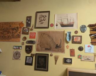 Assemblage of collectibles and art as displayed by the owner