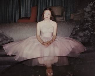 Wearing the pink party dress