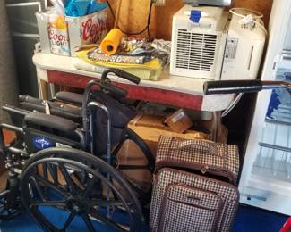 Travel wheelchair; window air conditioning units