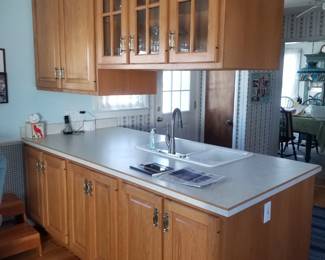 Lovely kitchen with handsome wood cabinets