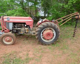 Vintage Massey-Ferguson tractor with auger 