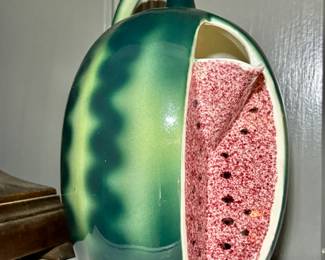 Variety of collectible pottery, art glass and vintage ceramic pieces.