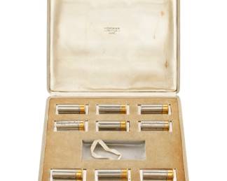 Lot 116: Hermes Chrome Gold Plated Bullet Place Card Holder