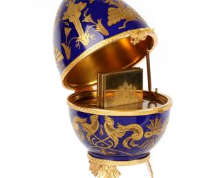 Lot 204: Limoges Faberge Porcelain Egg with Picture Frames