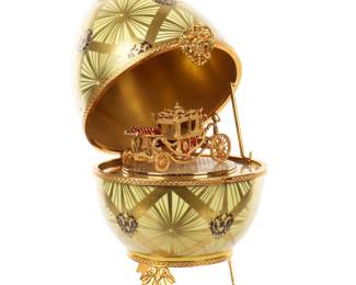Lot 201: Large Limoges Faberge Coronation Egg with Carriage