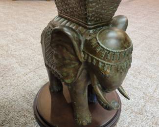 Glass top 'elephant' side table