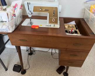 Singer in Sewing Cabinet