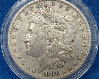 Lot 50. 1886 O Morgan silver dollar