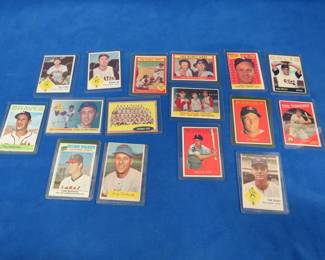 Lot 434. Sleeved baseball cards from the 50s, 60s, and 70s.