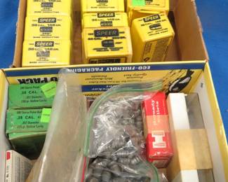 Lot 448. Speer and Sierra 38 cal. bullets for reloading. Four of the 148 grain bullet boxes are full. The other boxes are partially full as seen in the photos.