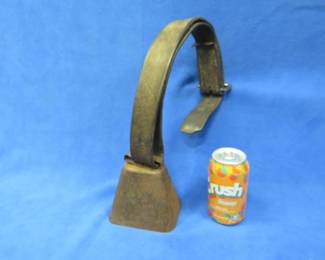 Lot 341. Antique cowbell with a leather strap