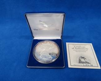Lot 465. 1995 giant half-pound Silver Eagle. 8 troy ounces of .999 pure silver. From the Washington Mint with a COA. No sales tax on this lot.