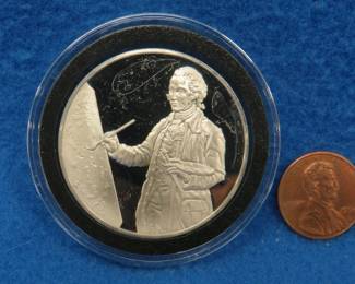 Lot 118. 1975 Postmasters of America sterling silver medallion. Total coin weight 24.9 grams.