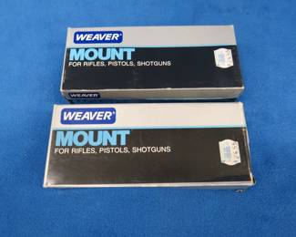 Lot 312. Two new-in-the-package Weaver long side mounts. {#}49340.
