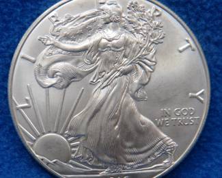 Lot 459. 2016 American Silver Eagle. One ounce of .999 fine silver.