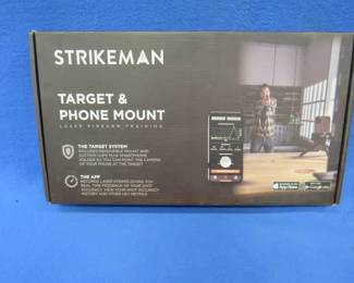 Lot 264. Strikeman Target System including 9mm laser practice round. New-in-the-box.