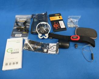 Lot 263. Wahl hair trimming kit, Bose earbuds in excellent condition, eyeglass retainers, and more