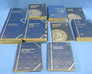 Lot 472. 42 empty coin albums, pennies to silver dollars.
