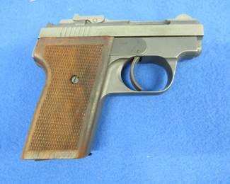 Lot 11. Rare Plainfield Ordnance Model 71 semi-auto pistol. Ser. No. 000855. Can be converted from .22 LR to .25 auto. Original box with all original parts.