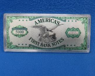 Lot 175. Four troy oz. of .999 silver in a reproduction $2 Continental Bank Note