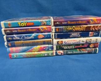 Lot 435. 35 VHS tapes. Most all are Disney. Locking lid tote included.