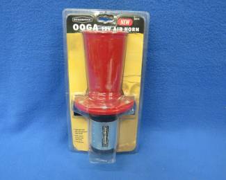 Lot 235. New-in-the-package 12-volt ooga style electric air horn. 110 decibles.