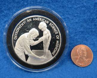 Lot 113. 1972 Postmasters of America sterling silver medallion. Total coin weight 24.9 grams.