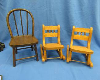 Lot 201. Two wooden doll rocking chairs and a chair