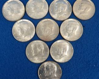 Lot 14. Ten 1964 90% silver Kennedy half dollars