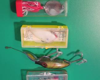 Lot 64. Tackle Industries Swimmin Minnow and Mighty Minnow in boxes with papers, Heddon Go Deeper River Runt, and Hildebrandt 4 1/2" spoon