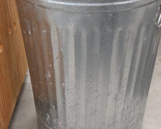 Lot 101. Galvanized trash can with pots and pans