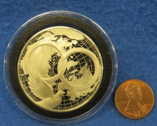 Lot 116. 1975 Postmasters of America sterling silver medallion. Total coin weight 24.05 grams.