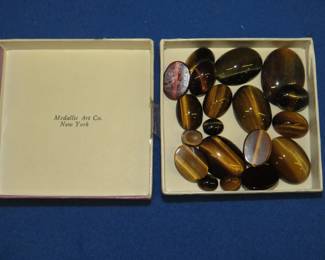 Lot 177. Polished Tiger Eye gemstones. 50.1 grams total.