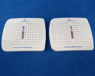 Lot 442. Two Liberty Renewable Mini-Dehumidifiers. Great for gun safes.