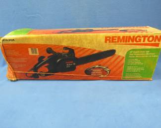 Lot 70. Remington 11.5 amp electric chainsaw with a 16" bar. Started on the first pull.
