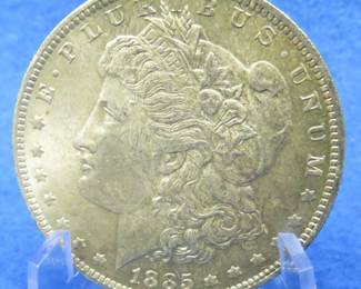Lot 377. 1885 O Morgan Silver Dollar