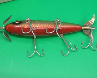 Lot 100. NIP 2001 Winchester 5-hook maroon with gold 2nd minnow bait with box and papers
