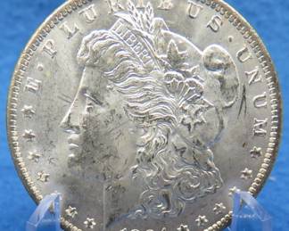 Lot 379. 1884 O Morgan Silver Dollar