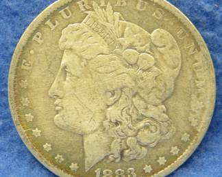 Lot 251. 1883 O Morgan silver dollar