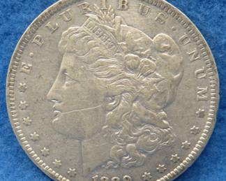 Lot 252. 1889 O Morgan silver dollar
