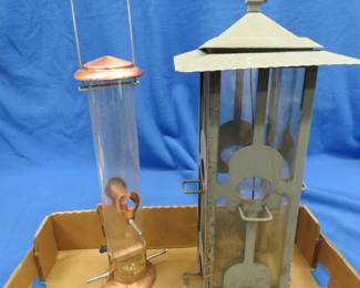 Lot 166. Two bird feeders