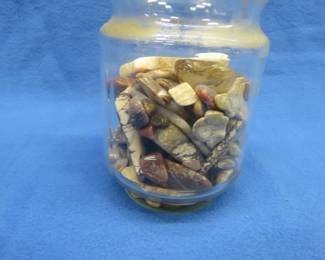 Lot 72. Polished rocks with some agates
