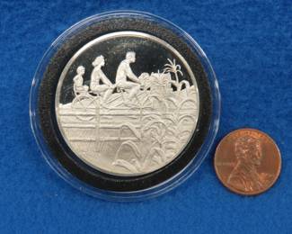 Lot 115. 1974 Postmasters of America sterling silver medallion. Total coin weight 25.3 grams.