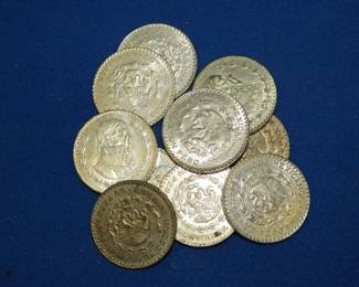 Lot 176. Ten Mexican one peso 10% silver coins. Dates range from 1957-1967.