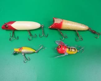 Lot 226. Four lures: South Bend 3 1/2" wooden Bass-Oreno, Heddon wooden No Eye Lucky 13m, Heddon Tiny Crazy Crawler, Heddon Tiny River Runt