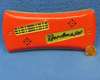 Lot 316. Bandmaster double-sided tremelo harmonica with very good sound