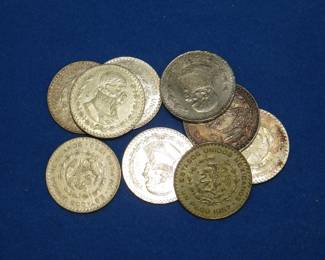 Lot 172. Ten Mexican one peso 10% silver coins. Dates range from 1957-1966.
