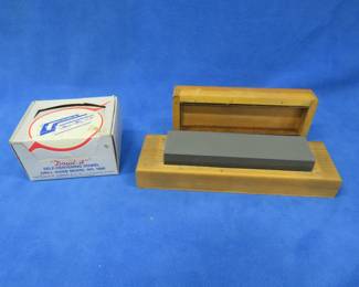 Lot 291. Dowl-It self-centering dowel. Drill guide model {#} 1000. Honing stone.